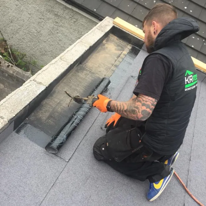 Working on a flat roof.